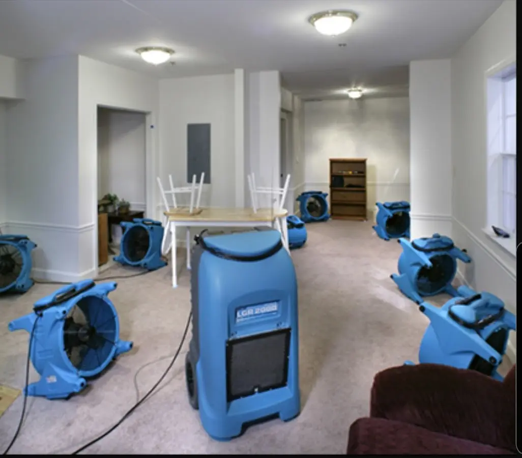 Air movers and dehumidifier setup for Water Extraction & Removal in Raymore